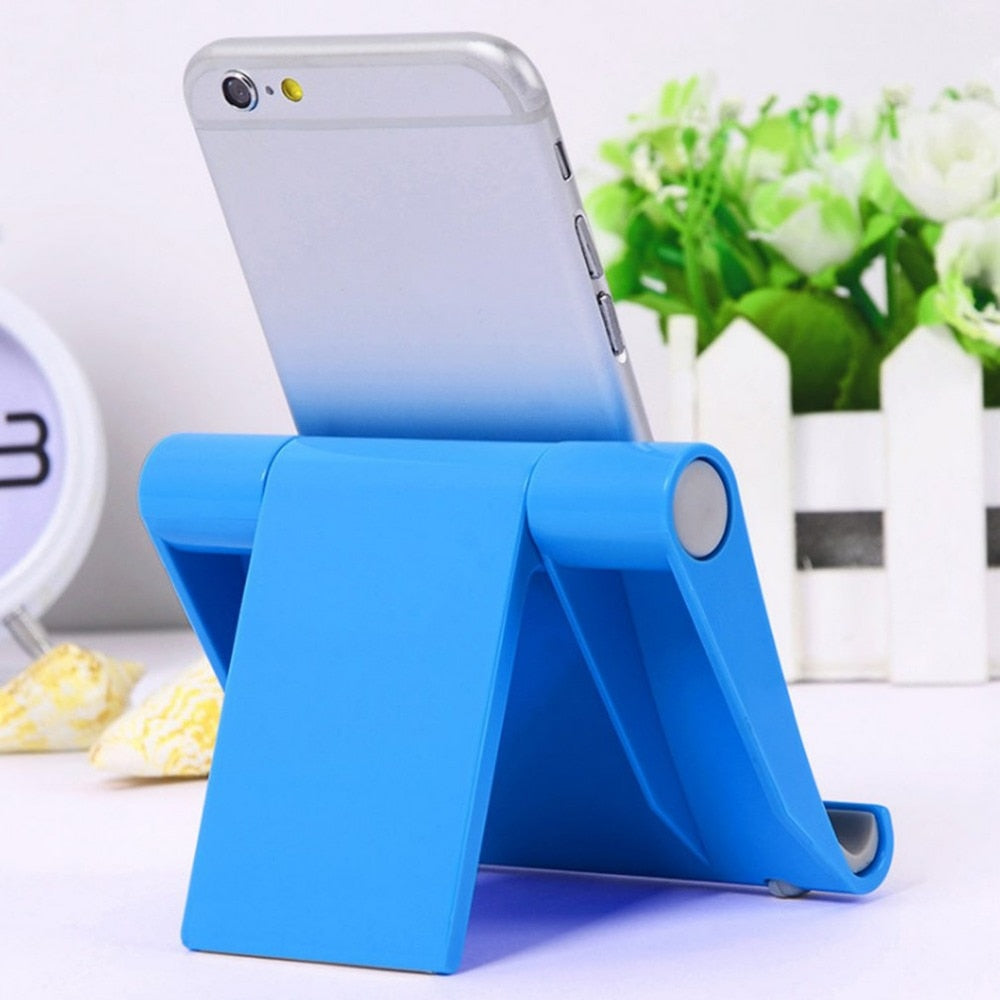 Multi-functional phone table holder